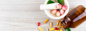 open bottle of supplements laying flat on a worktop